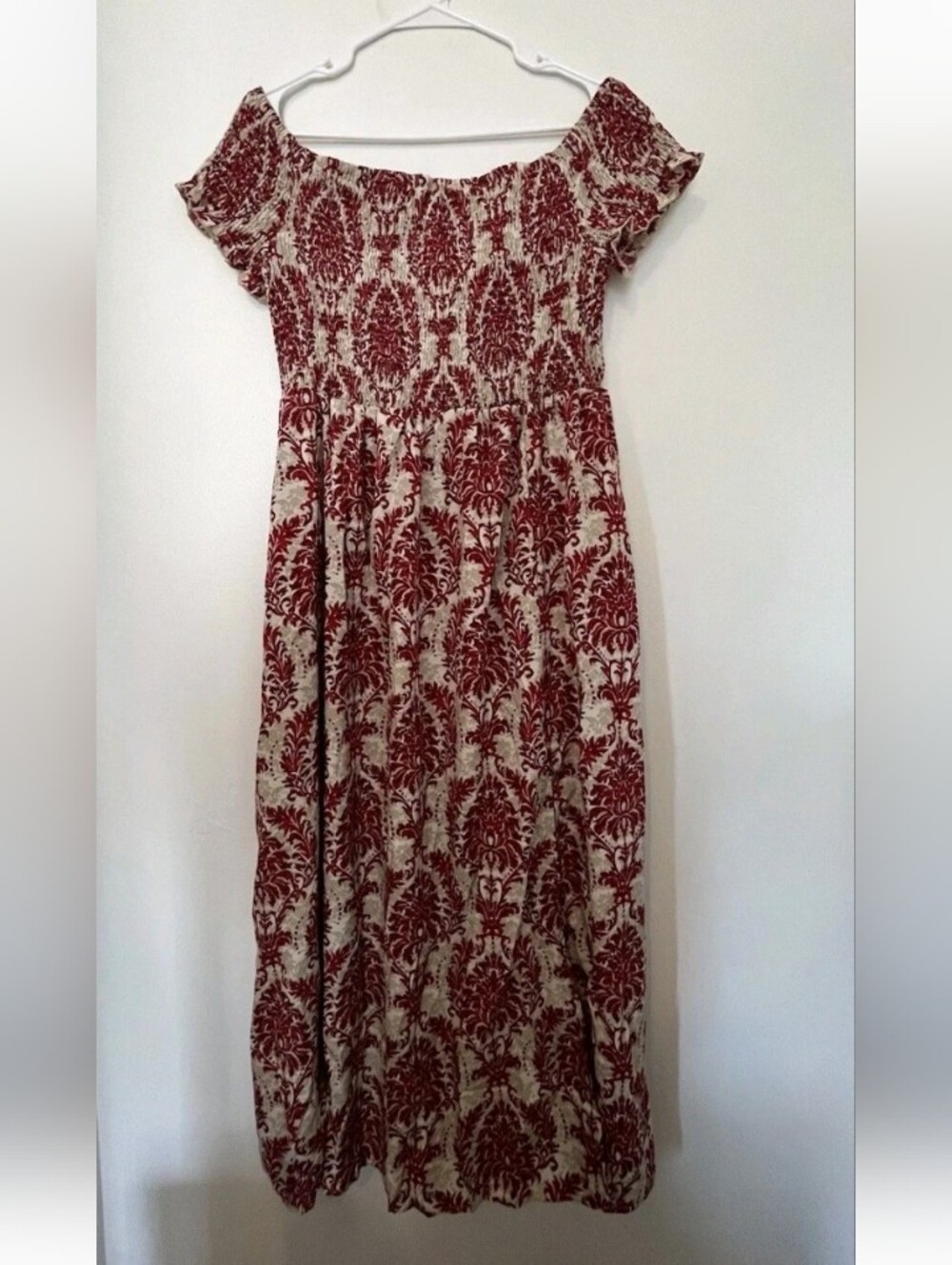Loose floral summer dress with side slit . The upper section is stretched. Boho